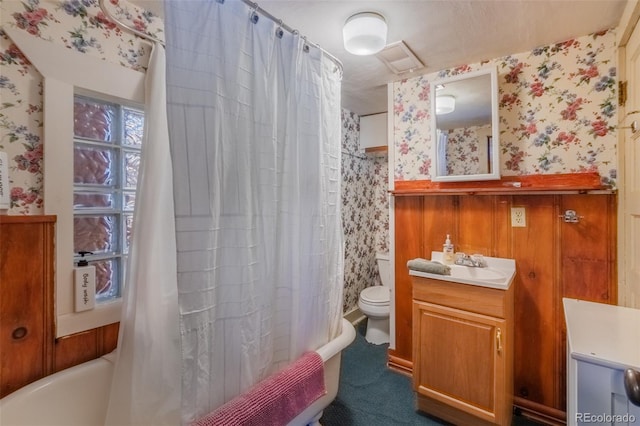 full bathroom with vanity, toilet, and shower / bathtub combination with curtain