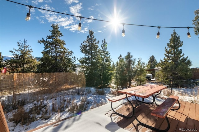 view of snow covered deck