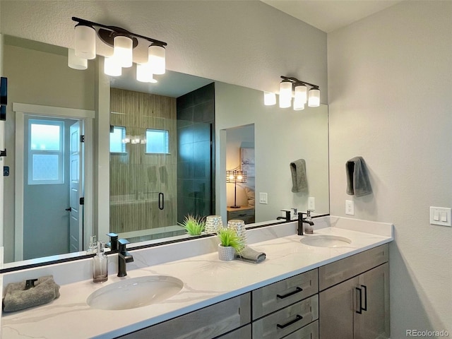 bathroom featuring vanity and walk in shower
