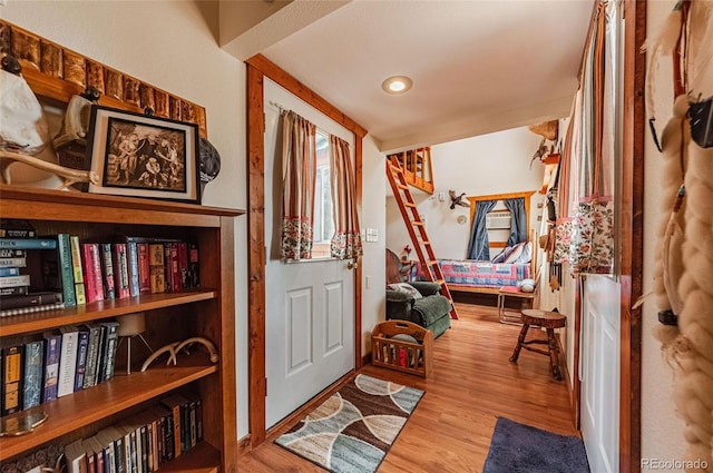 foyer entrance with wood finished floors