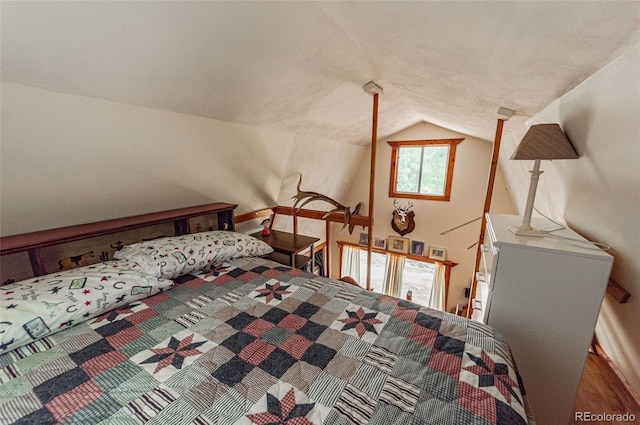 bedroom with vaulted ceiling
