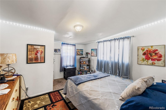 609 W 8th St Unit 611, Pueblo, CO 81003 - bedroom with baseboards and carpet floors