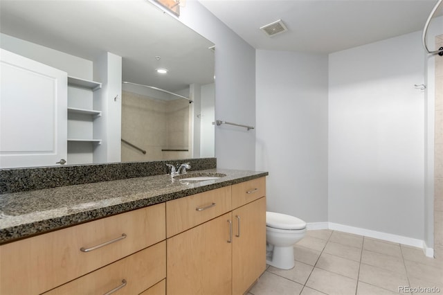 1700 Bassett St Unit 1102, Denver, CO 80202 - full bathroom featuring vanity, toilet, baseboards, tile patterned flooring, and a shower