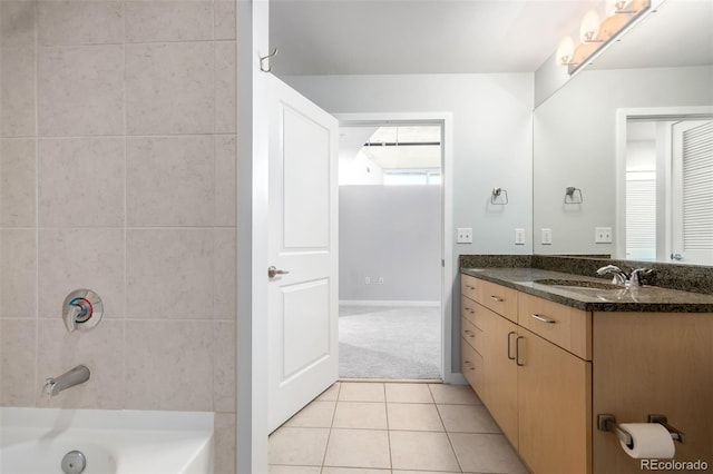 1700 Bassett St Unit 1102, Denver, CO 80202 - full bathroom featuring vanity, tile patterned flooring, and tub / shower combination
