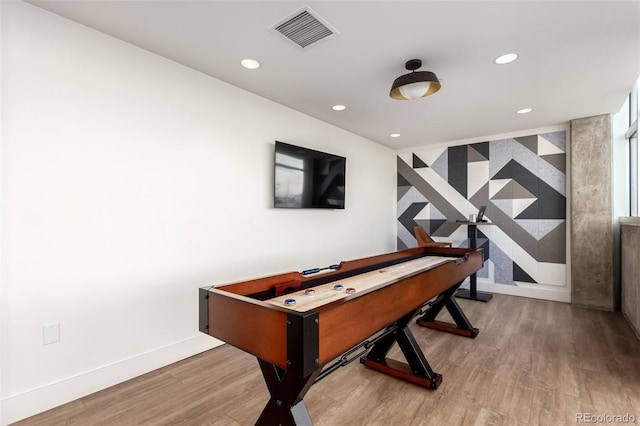 1700 Bassett St Unit 1102, Denver, CO 80202 - playroom with recessed lighting, wood finished floors, and baseboards