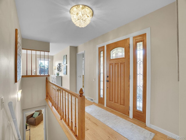 6844 S Detroit Cir, Centennial, CO 80122 - entryway with wood finished floors and baseboards