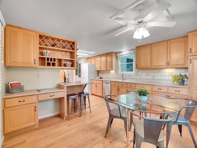 6844 S Detroit Cir, Centennial, CO 80122 - kitchen featuring light brown cabinets, white refrigerator with ice dispenser, open shelves, light wood-style floors, and backsplash