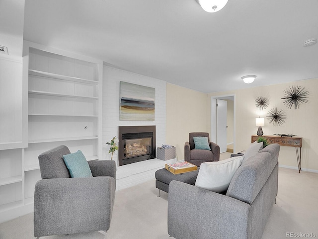 6844 S Detroit Cir, Centennial, CO 80122 - living area with built in shelves, carpet flooring, and a brick fireplace