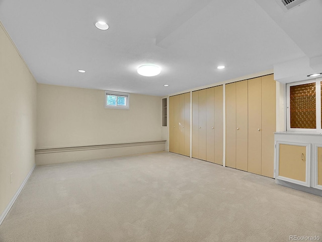 6844 S Detroit Cir, Centennial, CO 80122 - below grade area with carpet, recessed lighting, and a baseboard heating unit
