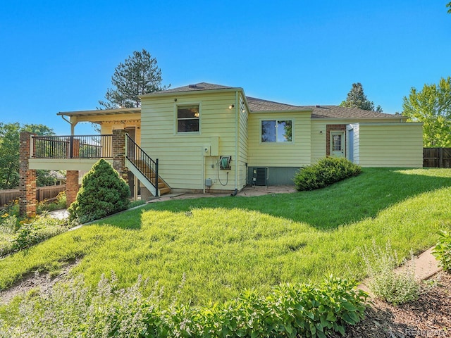 6844 S Detroit Cir, Centennial, CO 80122 - rear view of property with stairs and a wooden deck