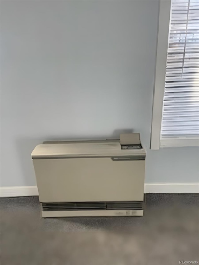 details featuring concrete floors and baseboards