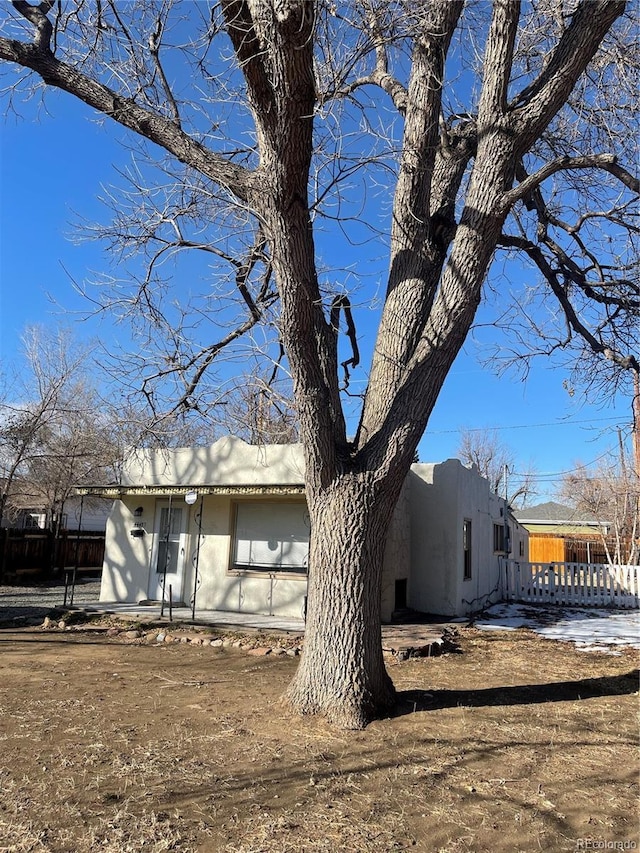 exterior space with stucco siding