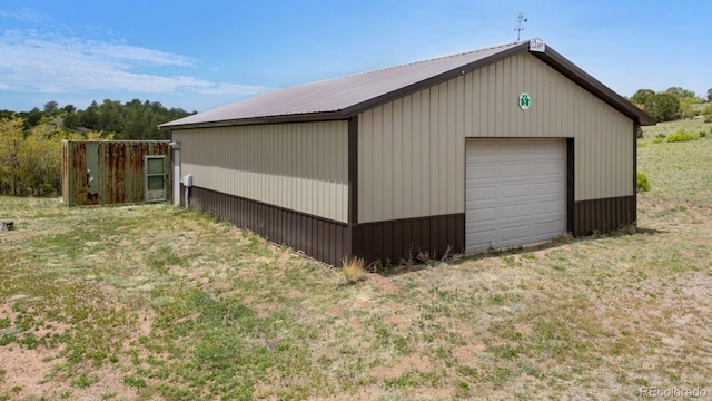 garage with a lawn