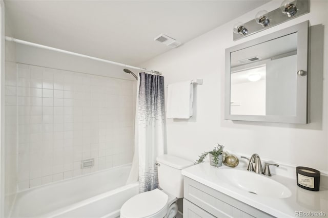 full bathroom featuring toilet, vanity, and shower / tub combo