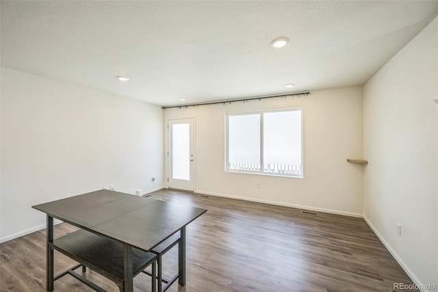 18211 E 51st Ave, Denver, CO 80249 - interior space featuring wood finished floors, baseboards, and recessed lighting