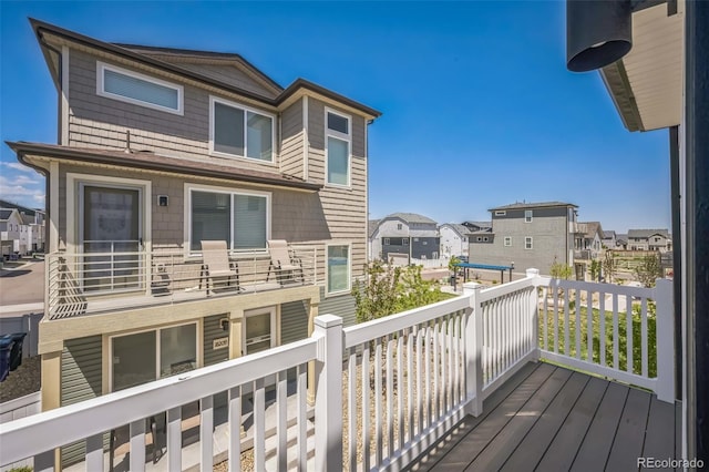 18211 E 51st Ave, Denver, CO 80249 - wooden terrace featuring a residential view