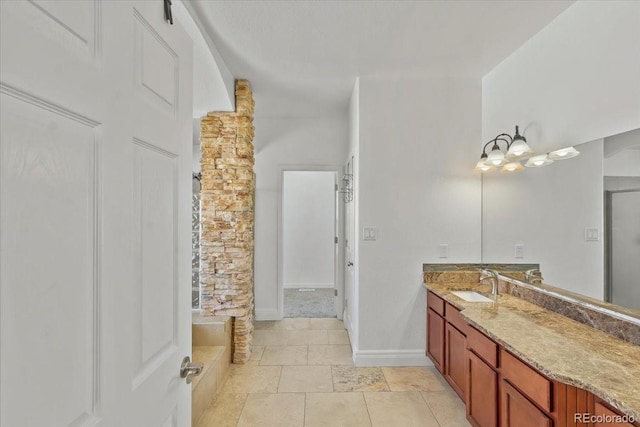 bathroom featuring tile patterned floors and vanity