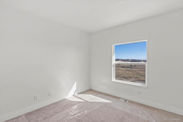 view of carpeted spare room