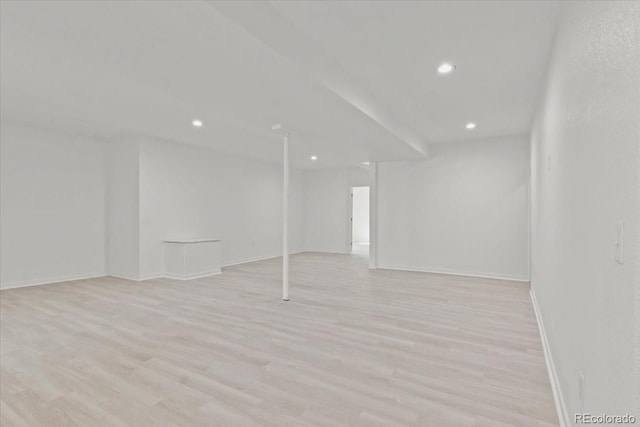 spare room featuring light hardwood / wood-style floors