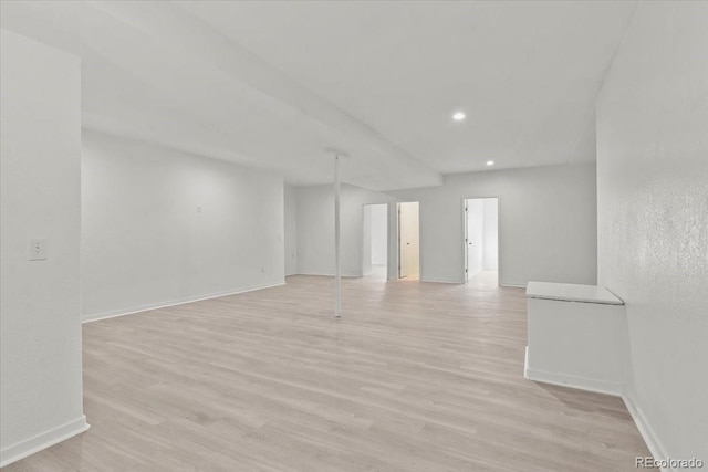 unfurnished room with light hardwood / wood-style flooring