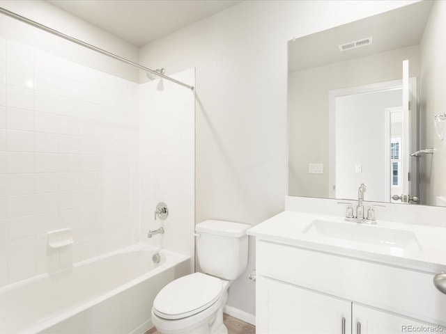 full bathroom with vanity, washtub / shower combination, and toilet