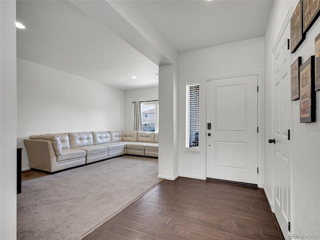 19155 Robins Dr, Denver, CO 80249 - foyer entrance featuring dark wood-style floors and recessed lighting