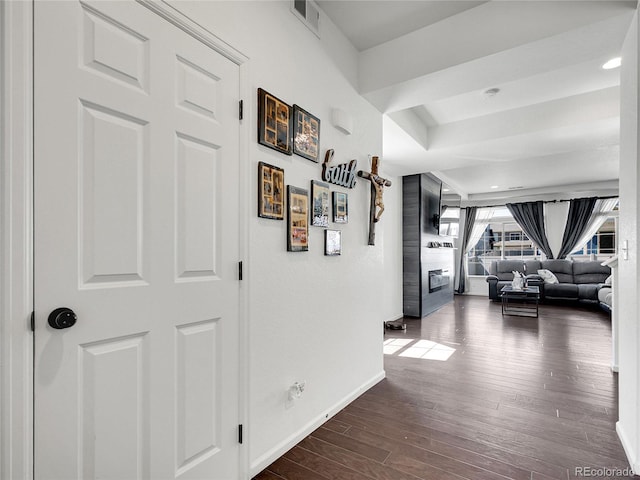 19155 Robins Dr, Denver, CO 80249 - corridor featuring dark wood-style flooring and baseboards