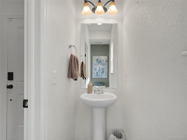 19155 Robins Dr, Denver, CO 80249 - bathroom featuring a textured wall