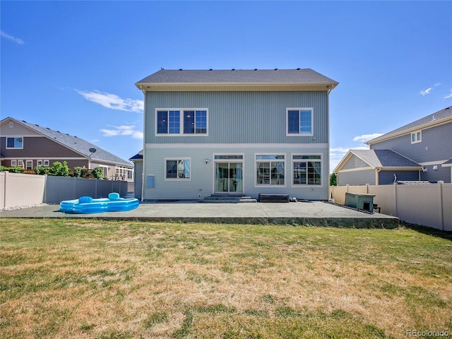 19155 Robins Dr, Denver, CO 80249 - back of house with a patio area and a fenced backyard