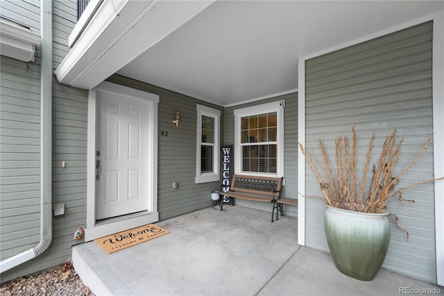 entrance to property with a porch