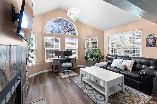 living room with dark hardwood / wood-style floors, vaulted ceiling, and a chandelier