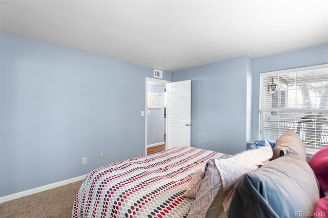 bedroom featuring carpet