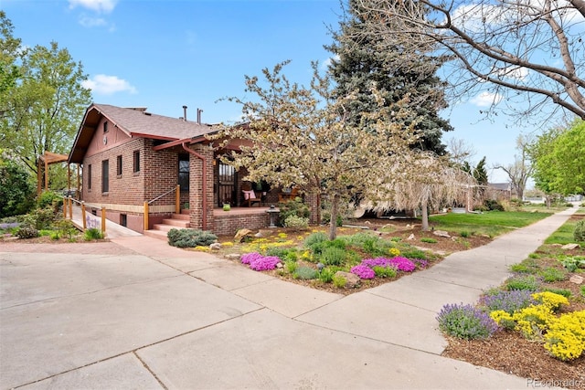 view of property exterior featuring brick siding
