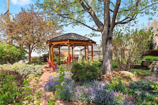 view of yard with a gazebo and fence