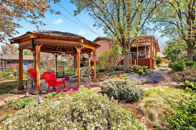 view of yard with a gazebo, a patio area, and fence