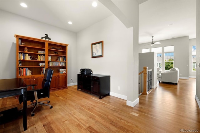 14443 W 88th Dr Unit B, Arvada, CO 80005 - office featuring light wood-style flooring, arched walkways, recessed lighting, and a ceiling fan