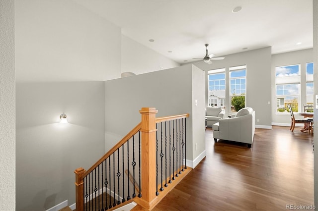 14443 W 88th Dr Unit B, Arvada, CO 80005 - hall with wood finished floors, an upstairs landing, a high ceiling, and recessed lighting