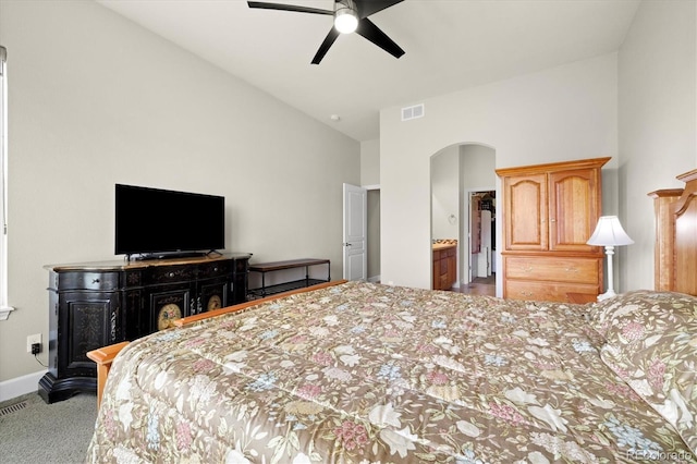 14443 W 88th Dr Unit B, Arvada, CO 80005 - carpeted bedroom with arched walkways, high vaulted ceiling, and ceiling fan