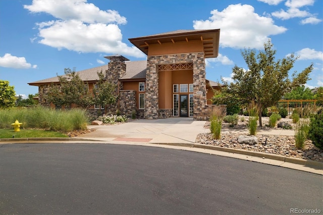 14443 W 88th Dr Unit B, Arvada, CO 80005 - view of front of home with stone siding and stucco siding