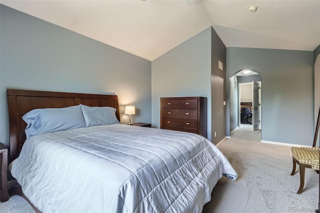 9890 Gaylord St, Thornton, CO 80229 - bedroom featuring lofted ceiling, carpet floors, and arched walkways