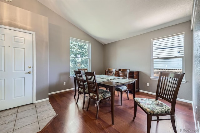 9890 Gaylord St, Thornton, CO 80229 - dining room with vaulted ceiling and wood finished floors