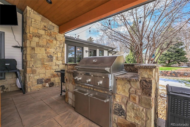 view of patio featuring area for grilling and grilling area