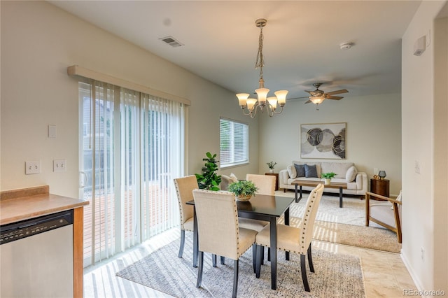 7345 S Nucla St, Aurora, CO 80016 - dining room featuring a chandelier and ceiling fan