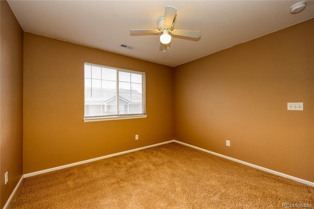 7345 S Nucla St, Aurora, CO 80016 - carpeted spare room with ceiling fan and a smoke detector