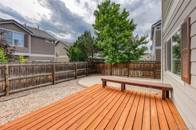 7345 S Nucla St, Aurora, CO 80016 - wooden deck with a fenced backyard