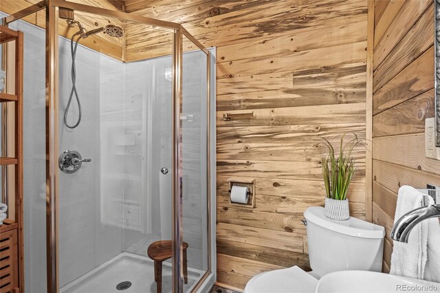 bathroom featuring wood walls, a shower with door, wooden ceiling, and toilet