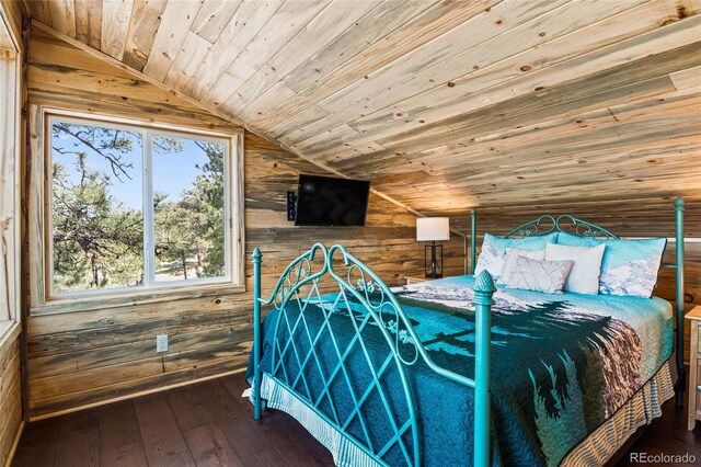 bedroom with wood walls, lofted ceiling, wood ceiling, and wood-type flooring