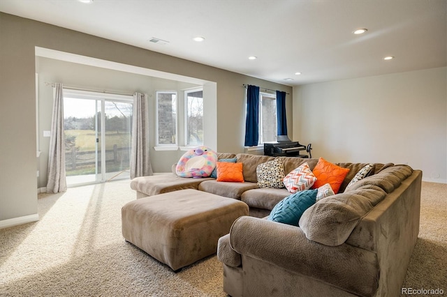 living room with light colored carpet