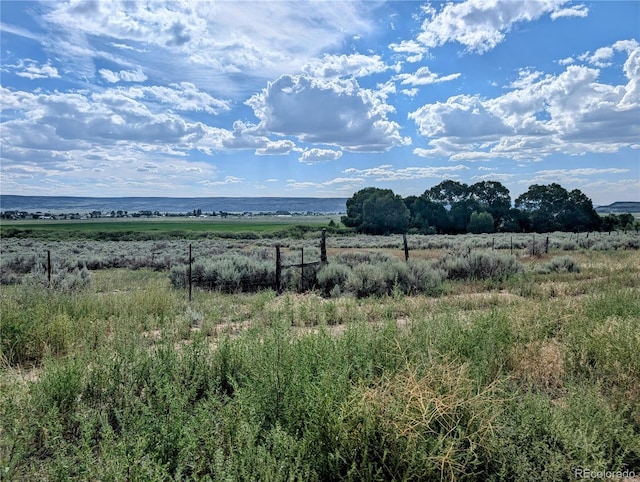 view of landscape with a rural view