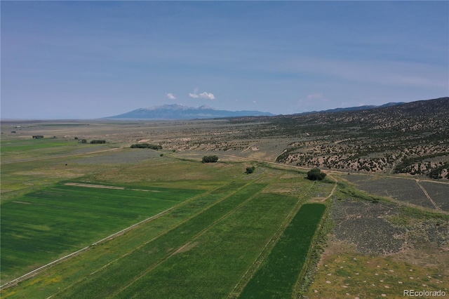 bird's eye view with a mountain view and a rural view